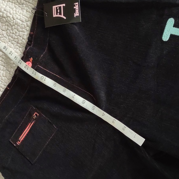 NWT TSUKI Market Size 34 Mischief Corduroy Trouser Spellout Leg Pants - Picture 9 of 15